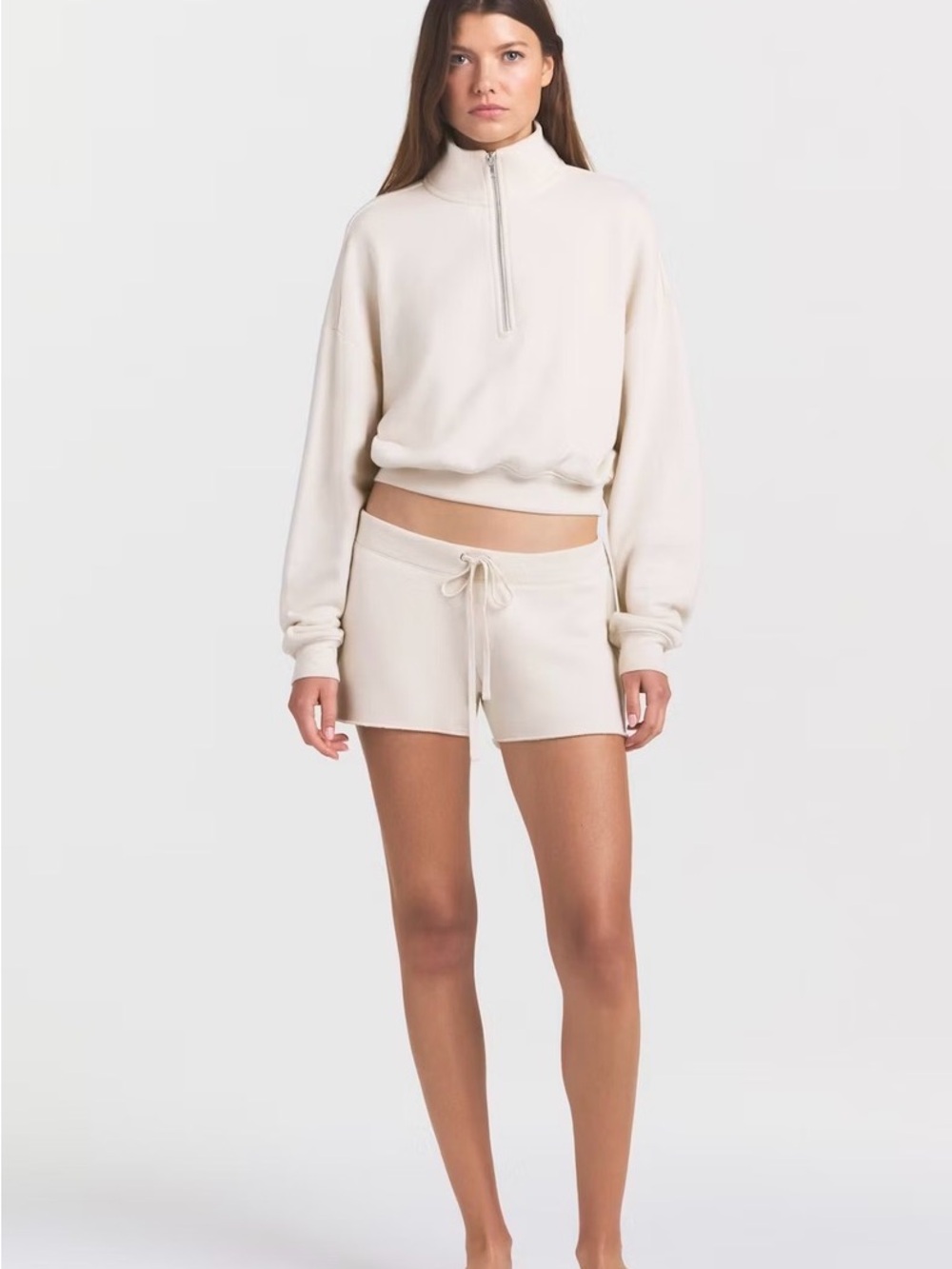 Skims drapey French terry half zip pullover 
Color buff